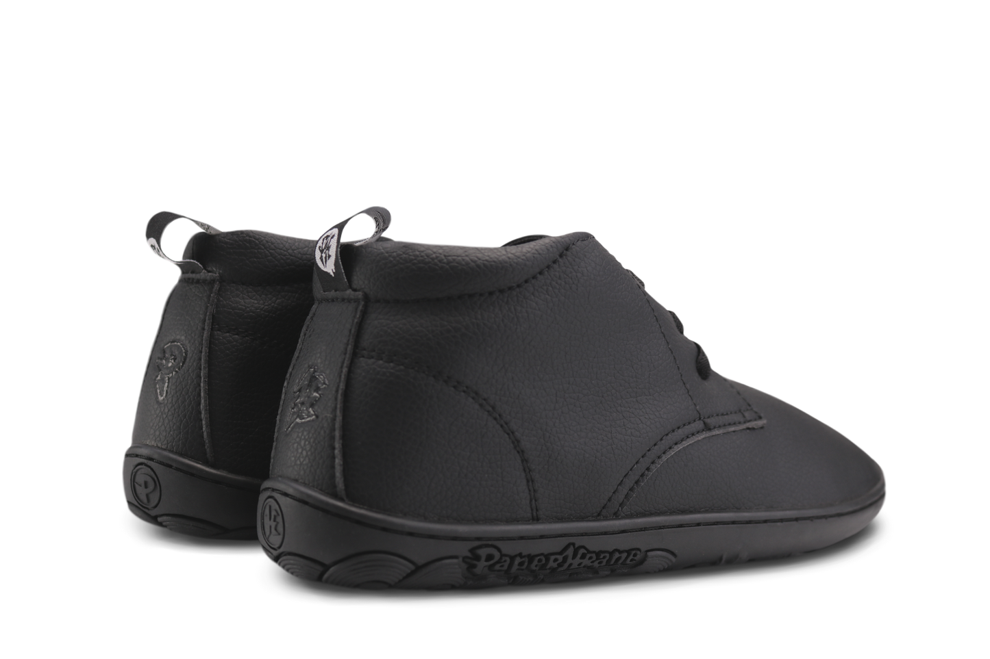 Black PaperKrane barefoot ankle boots from back on white background