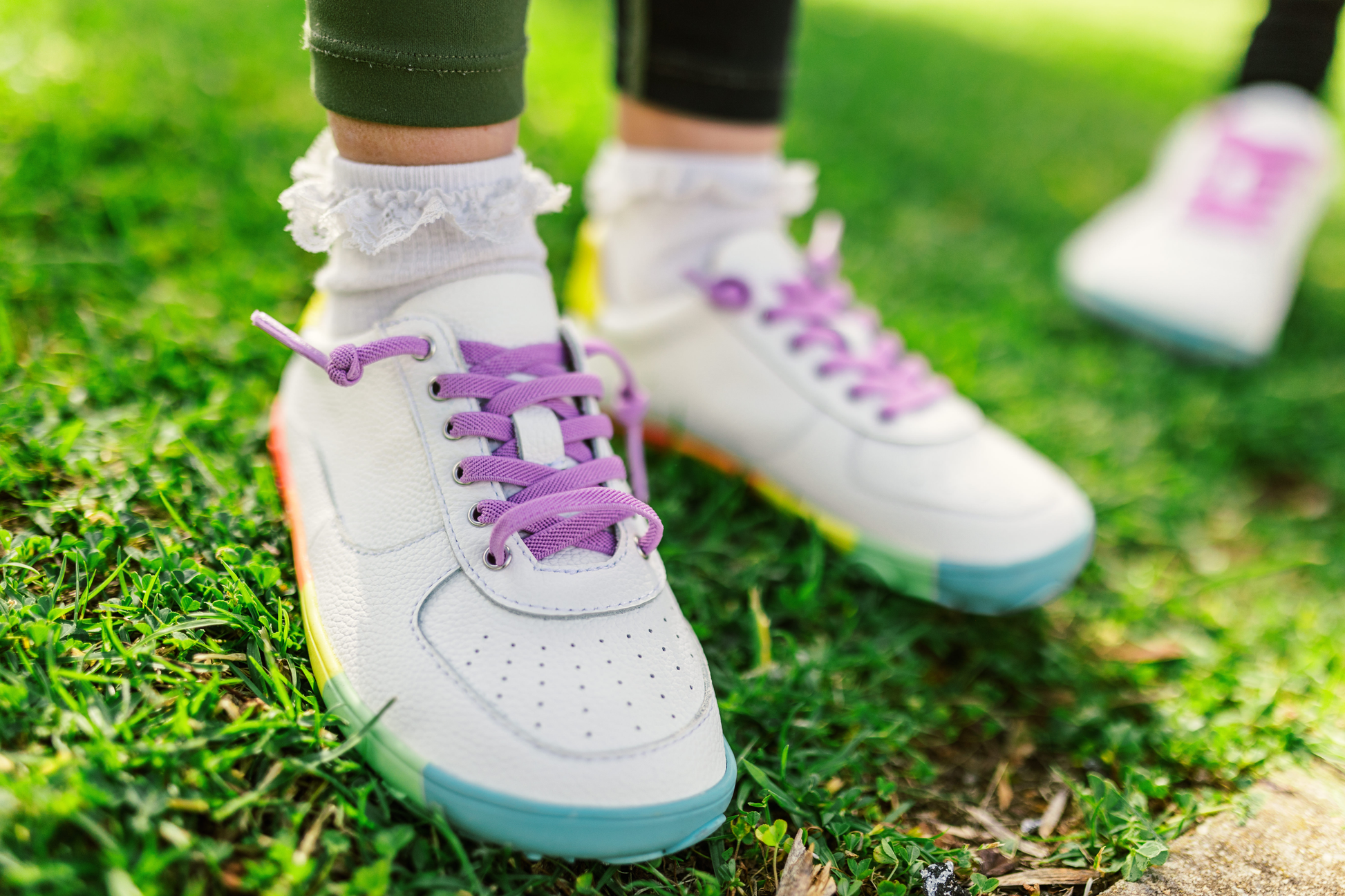 NEON LOWS IN JNR SIZING ON A SLIGHT ANGLE