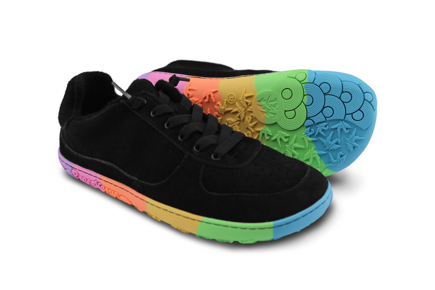 Black sneakers with multicoloured sole on a white background