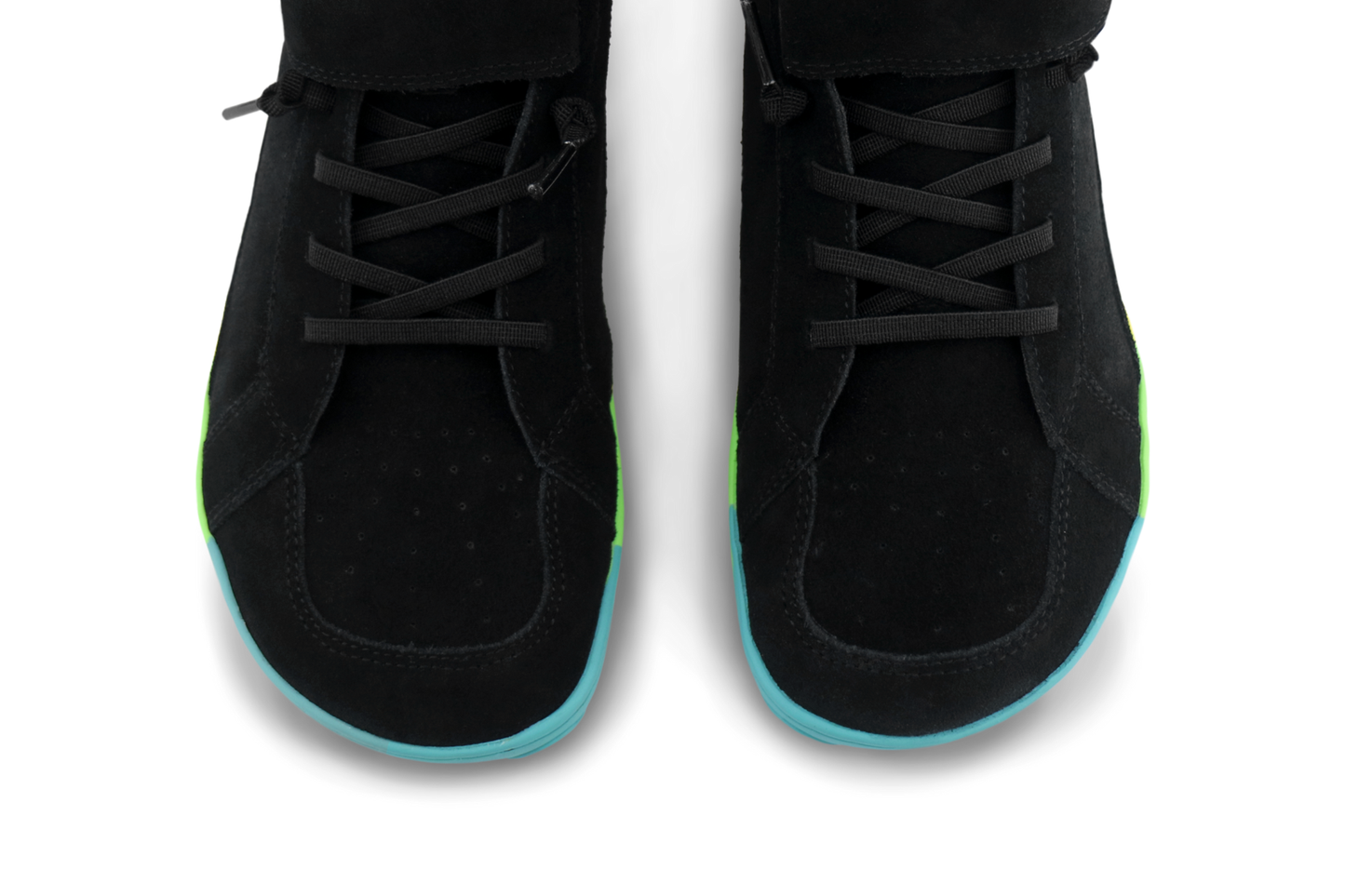 Black shoes with rainbow sole accents on a white background