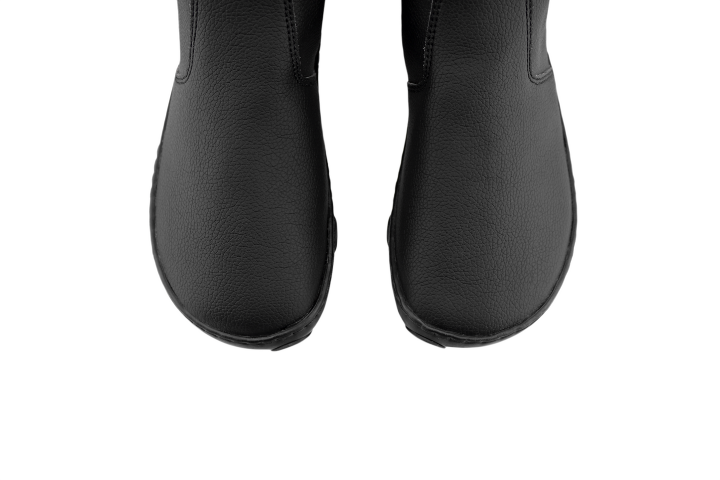ABOVE VIEW OF SLICK BOOT, BLACK VEGAN BAREFOOT CHELSEA BOOT