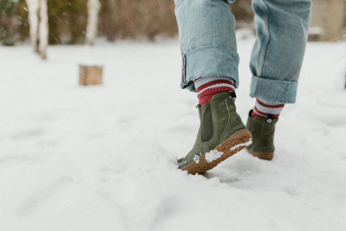 KHAKI BOOTS IN SNOW WITH HEEL LIFTED