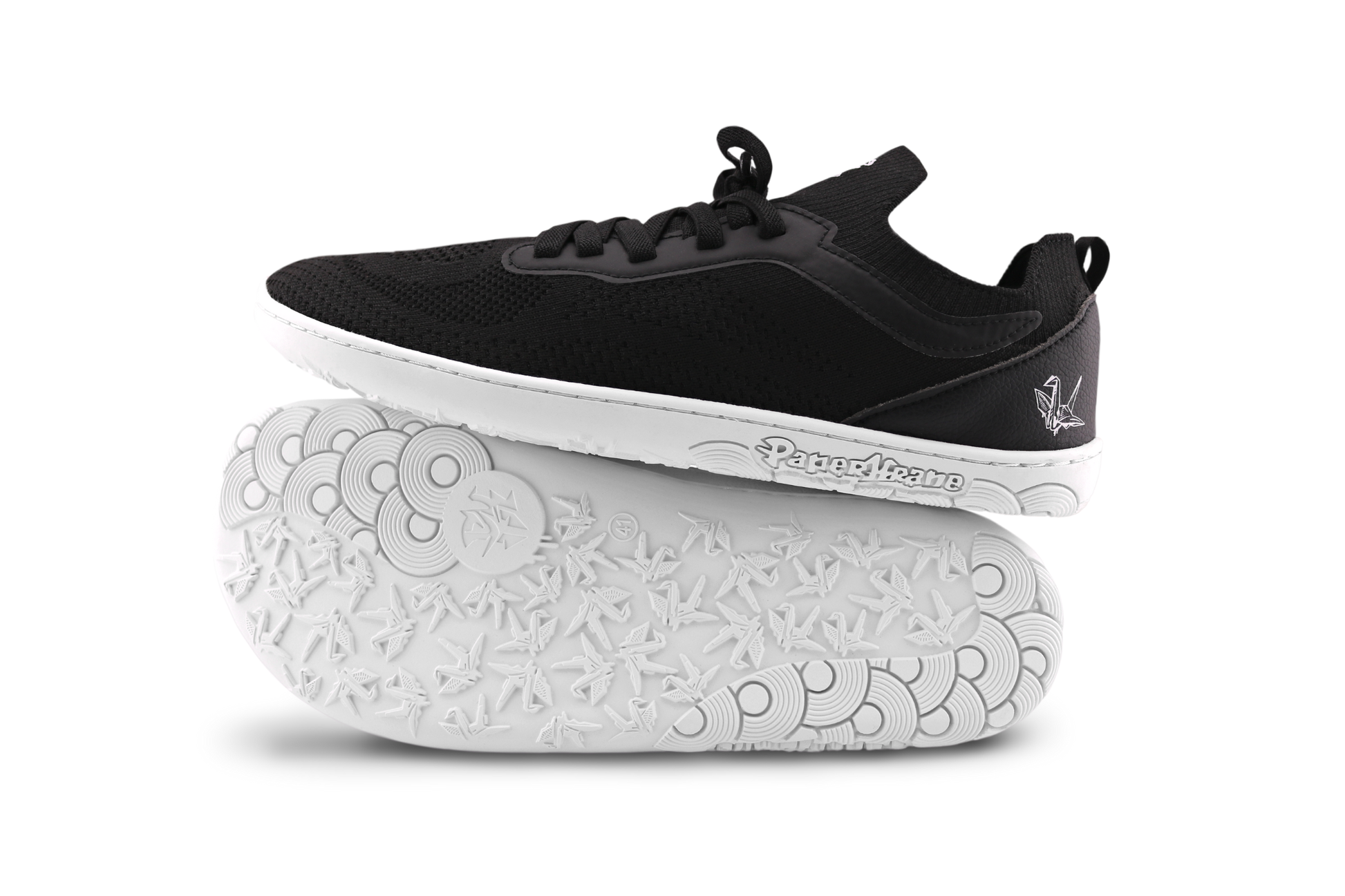 SIDE SOLE VIEW OF AKTIVE LOW SNEAKERS ON WHITE BACKGROUND