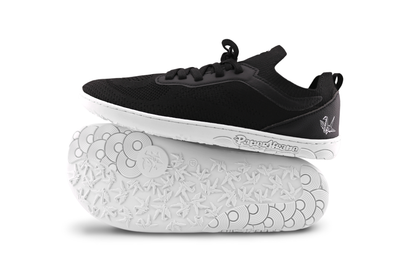 SIDE SOLE VIEW OF AKTIVE LOW SNEAKERS ON WHITE BACKGROUND