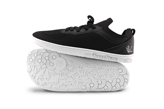 SIDE SOLE VIEW OF AKTIVE LOW SNEAKERS ON WHITE BACKGROUND