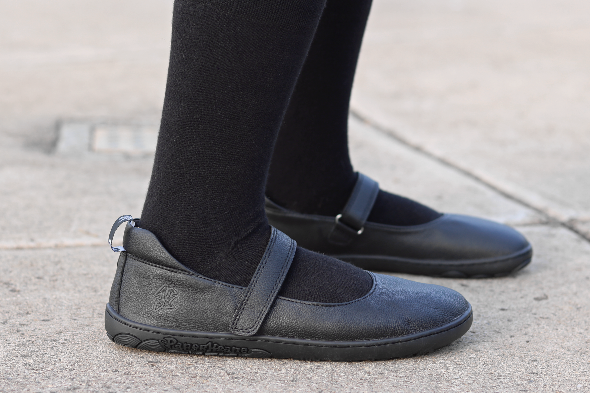 SIDE AND SOLE VIEW OF ADULT SIZE ATLAS MJ
