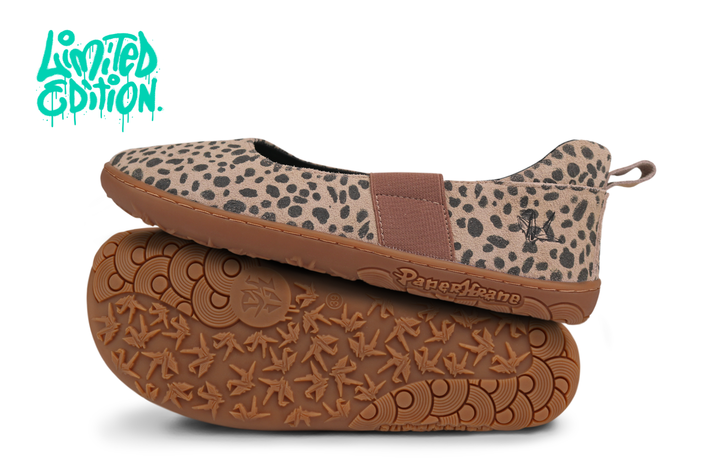 Pair of PaperKrane barefoot maryjane style slip ons with cheetah print pattern and foot-shaped gum sole on a white background. With "limited edition" written in teal in the top left corner. 