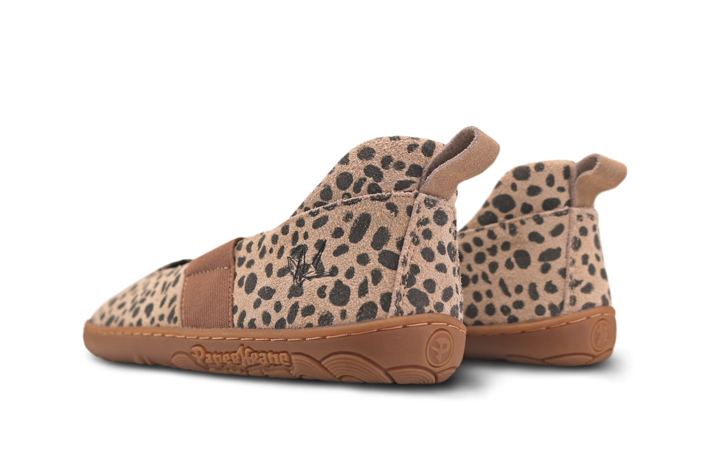 Pair of cheetah print MJs with gum soles on a white background