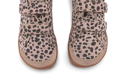 Pair of foot-shaped kids velcro sneakers with cheetah print pattern on a white background