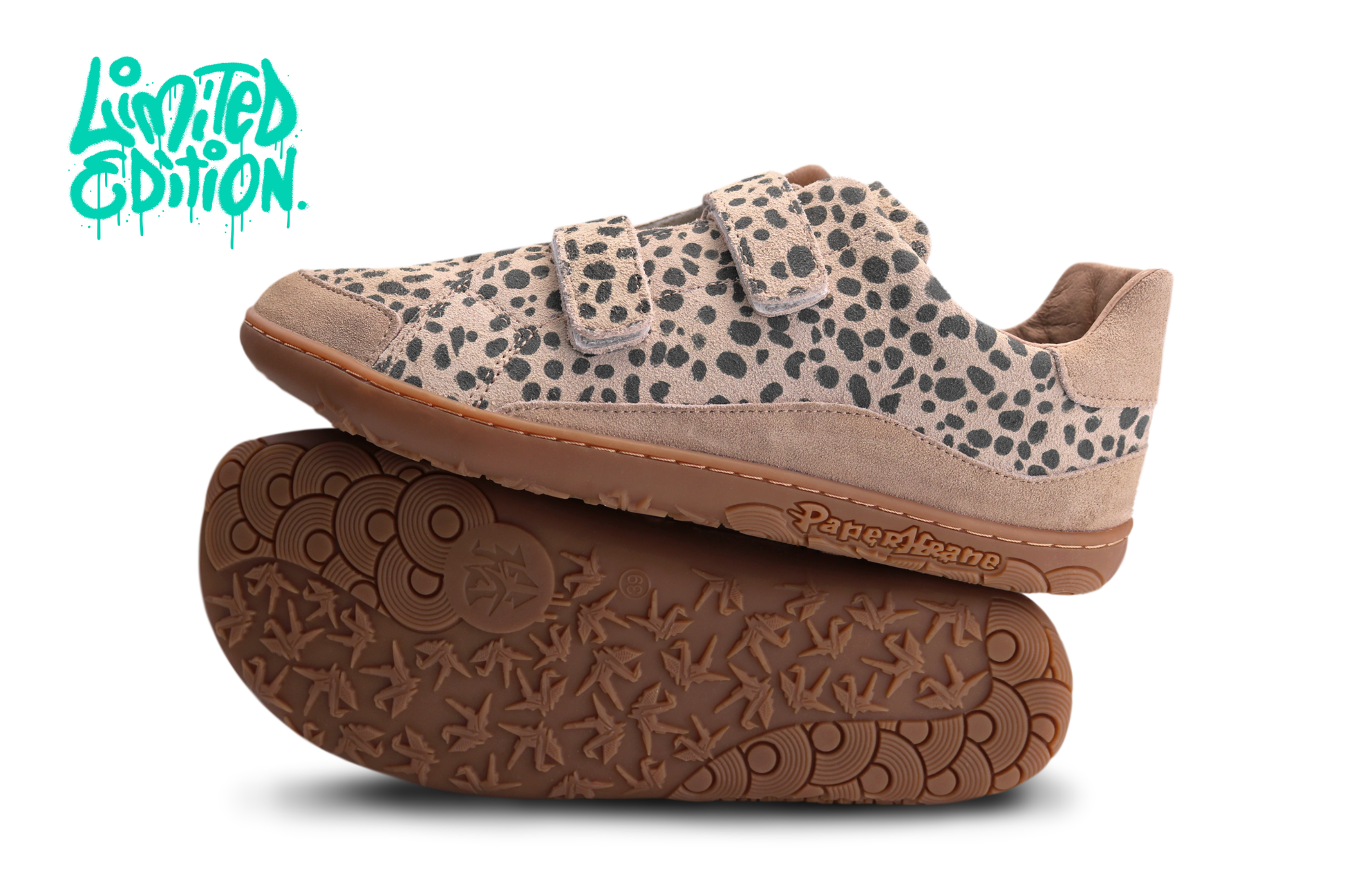 Pair of adult PaperKrane barefoot shoes with leopard print pattern and foot-shaped gum sole on a white background, with limited edition in teal writing. 