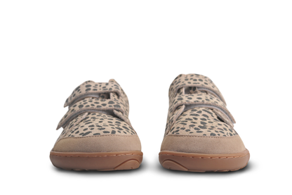 Adults foot-shaped cheetah print velcro sneakers on a white background.