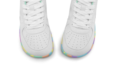 White low-top foot-shaped PaperKrane sneakers shown from a top-down view, featuring a white vegan leather upper with perforated details and a colourful rainbow gradient sole.