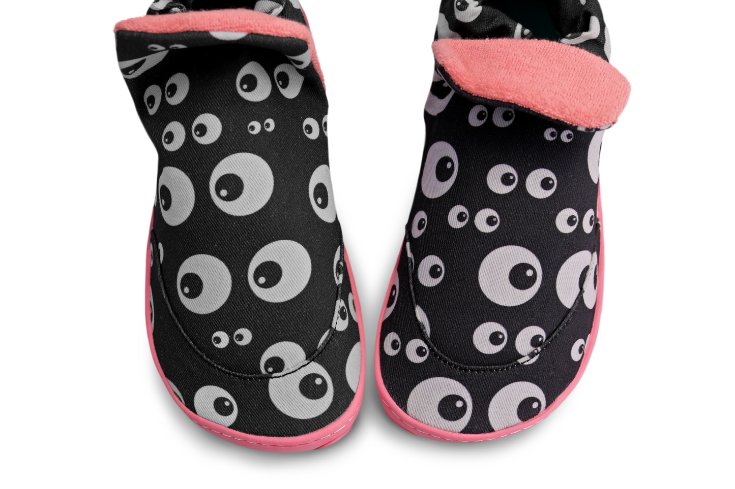 Above view of PaperKrane signature style slip on high tops. They're a foot-shaped, zero-drop cotton shoe with salmon lining and sole. The angle shows the shape of the shoe which has a nice wide toe box for growing feet, on a white background. 