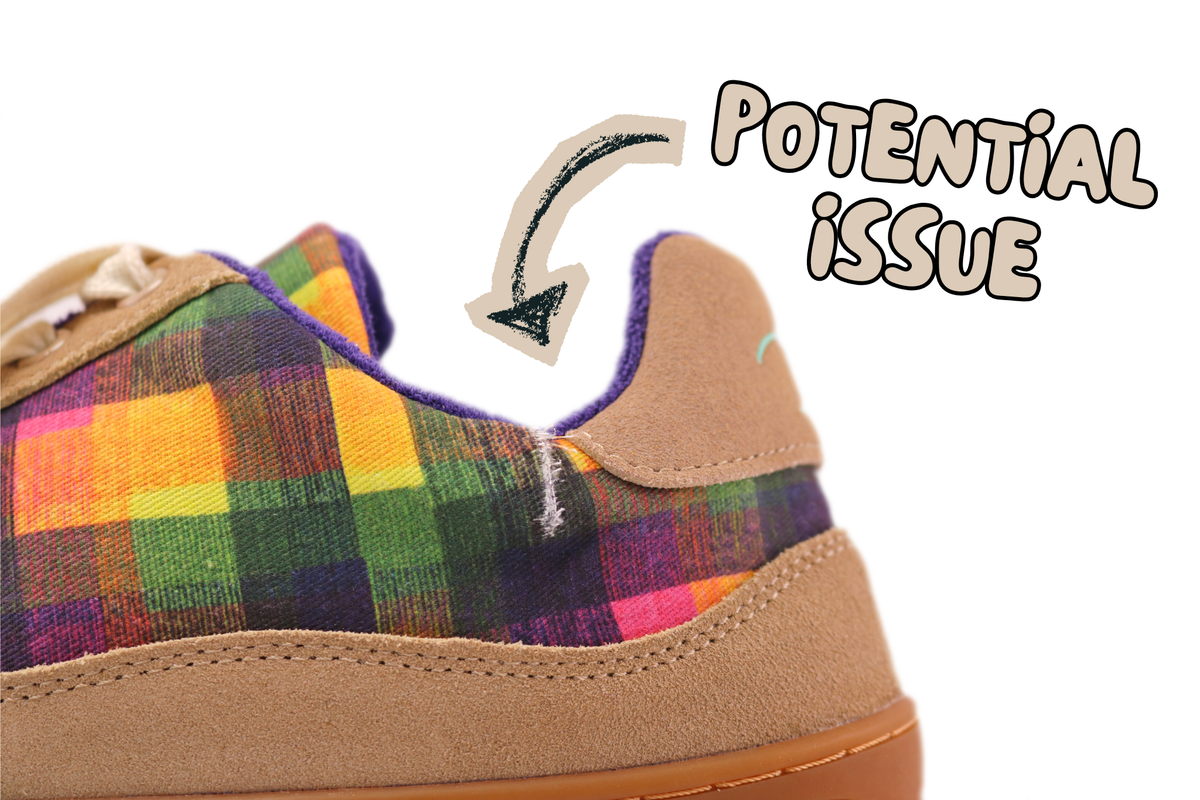 Close-up of the heel and side of a low-top sneaker with a multicolour plaid fabric upper and tan suede heel counter. A hand-drawn arrow points to a tear on the ankle area with the text 'POTENTIAL ISSUE' on a white background.