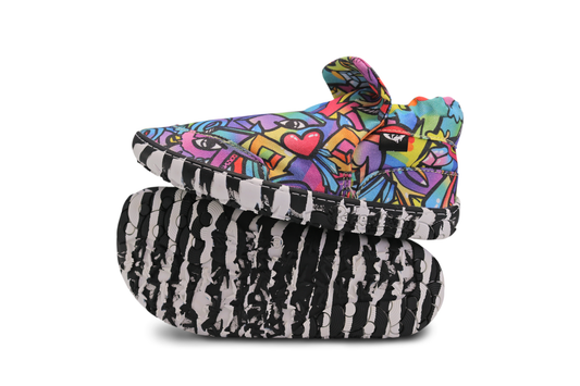 PaperKrane Graffiti signature style barefoot shoe slip ons, with hand-drawn graffiti print and zebra soles, can see the side and sole of one pair.