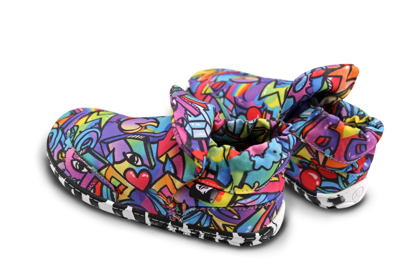 PaperKrane Graffiti signature style barefoot shoe slip ons, with hand-drawn graffiti print and zebra soles, this pair is angled up at the toes and you can see the back of the shoes.