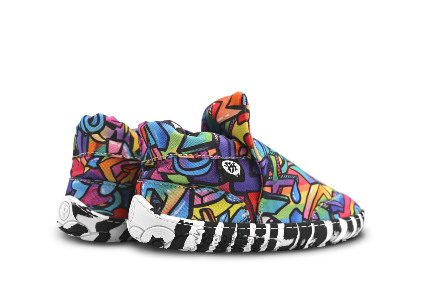 PaperKrane Graffiti signature style barefoot shoe slip ons, with hand-drawn graffiti print and zebra soles, viewed from the back, we can see the tongue pops up, and the elastic ankle design. 