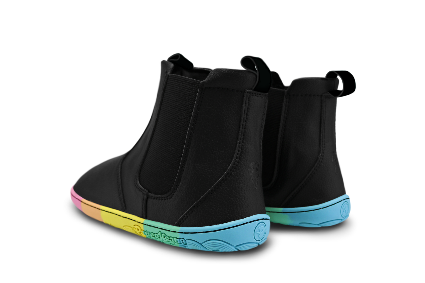 Black vegan leather chelsea boot from PaperKrane with rainbow zero drop sole. On the back of the boots there is a P and K logo embossed. The boots are on a white background.