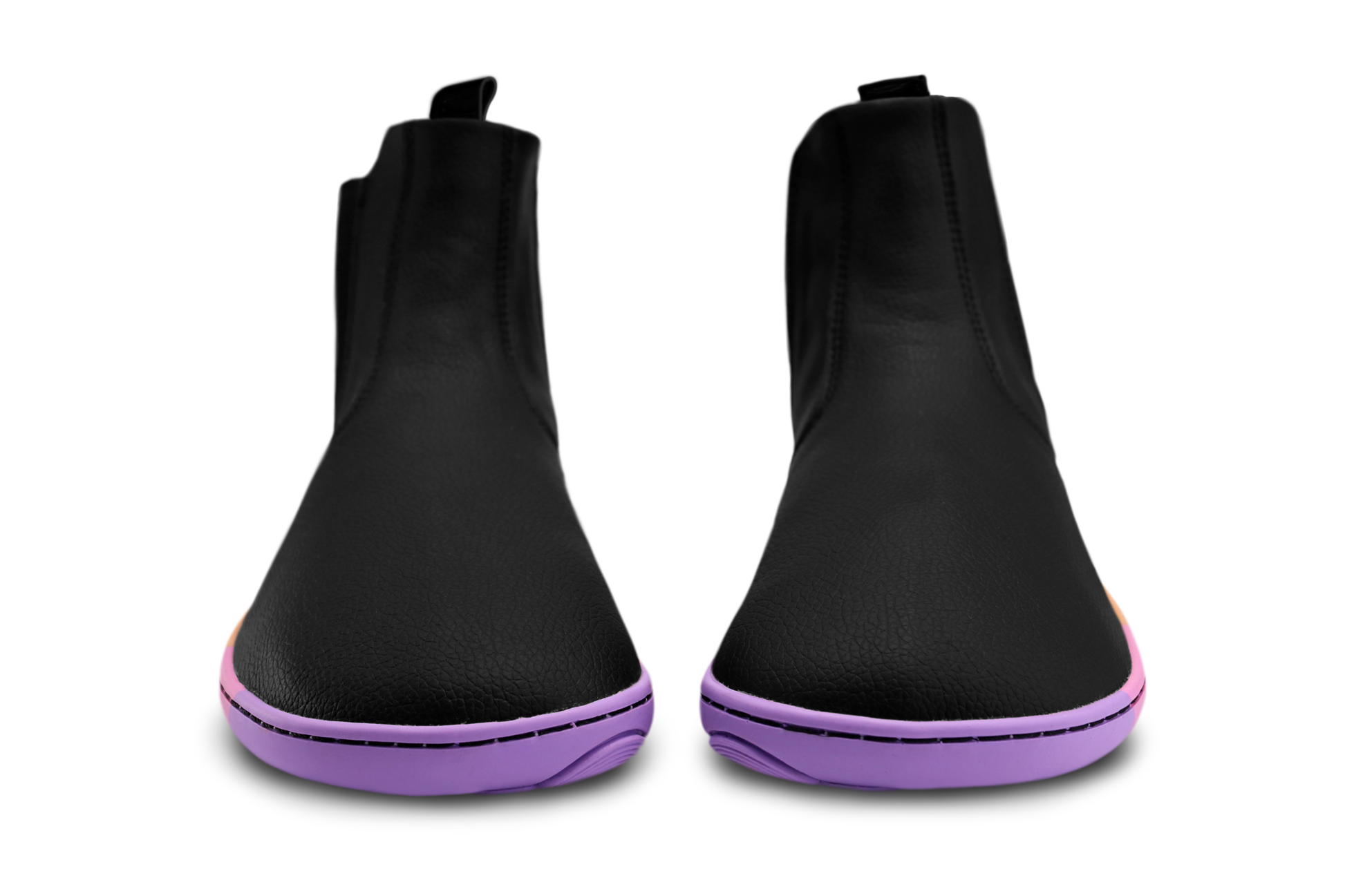 Black vegan leather chelsea boots from the front with wide toe box by PaperKrane, they have a rainbow sole on a white background. 