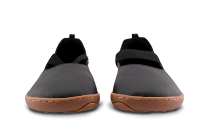 Front view of Licorice MJs from PaperKrane, a black vegan leather on gum sole with wide elastic band. On a white background.