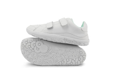 A pair of white kids' barefoot PaperKrane sneakers with velcro hook-and-loop straps, shown with one shoe standing upright and the other lying flat to display the textured sole, on a white background.