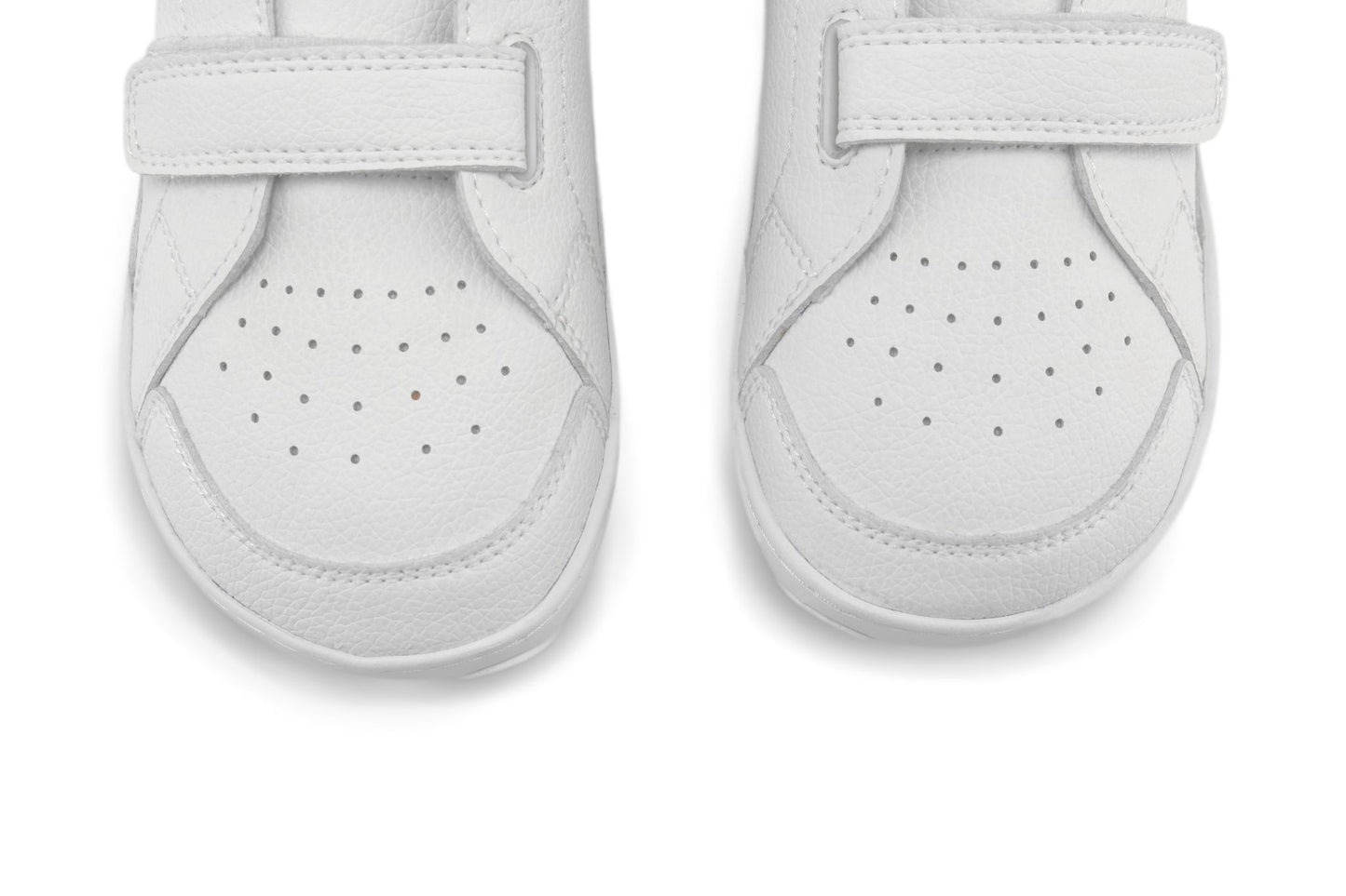 A pair of white PaperKrane foot-shaped vegan sneakers viewed from the toe end, featuring perforated uppers and wide hook-and-loop velcro strap closures, set against a plain white background.