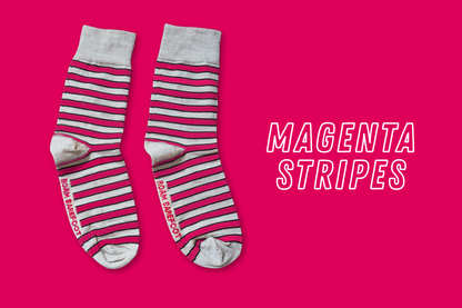 Pair of Roam Barefoot New Zealand made merino socks with magenta and beige/grey stripes on a magenta background