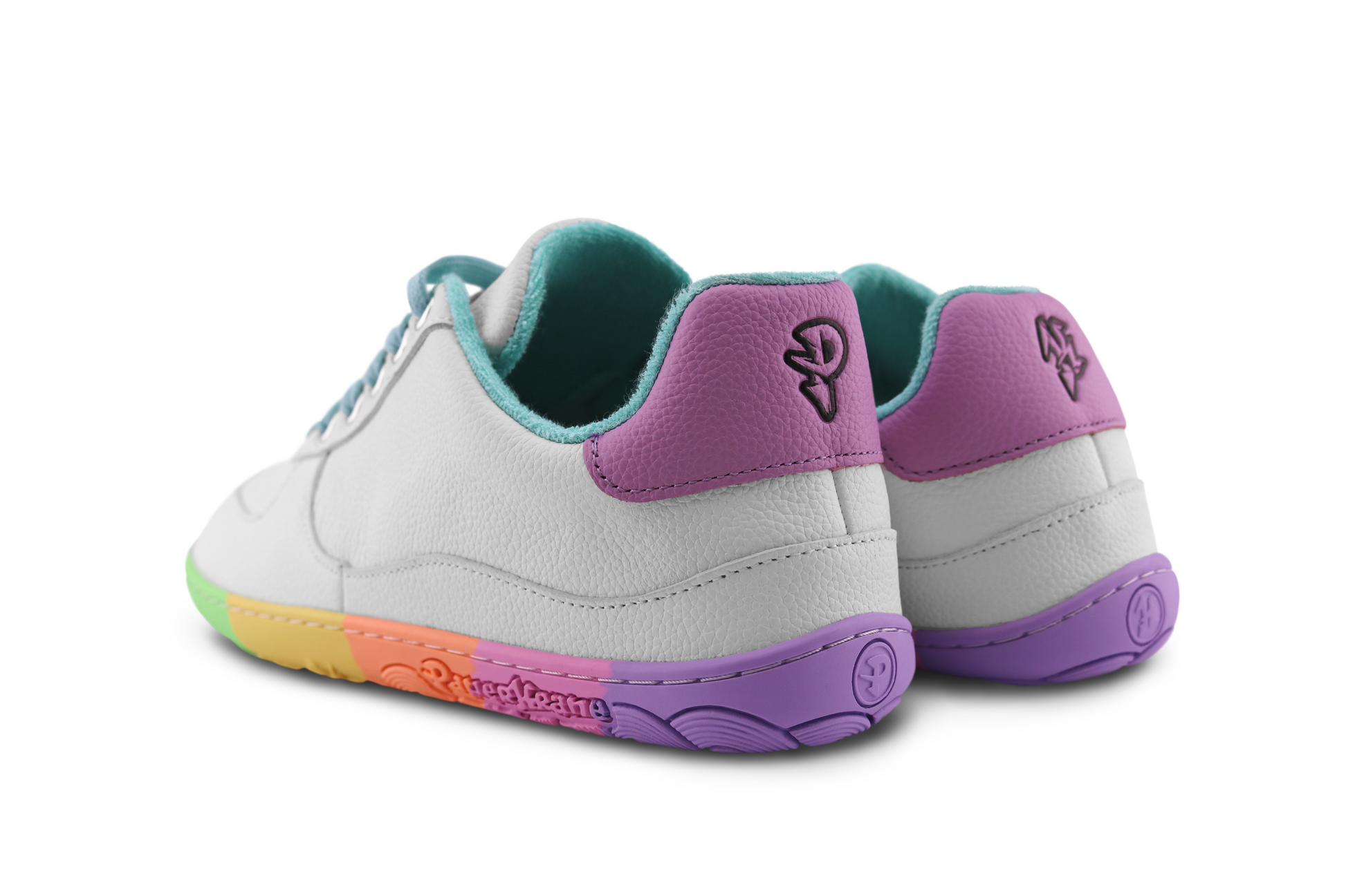 Pair of white sneakers with purple and rainbow accents on a white background