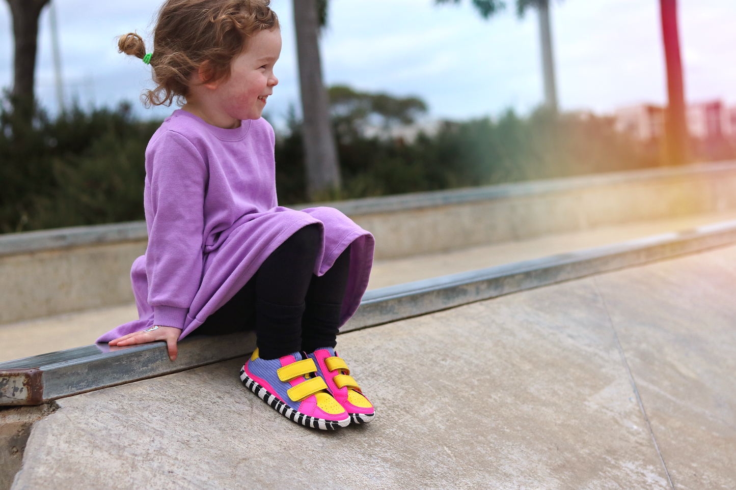 PUNKY VELCRO SHOES ON A SMILING CHILD