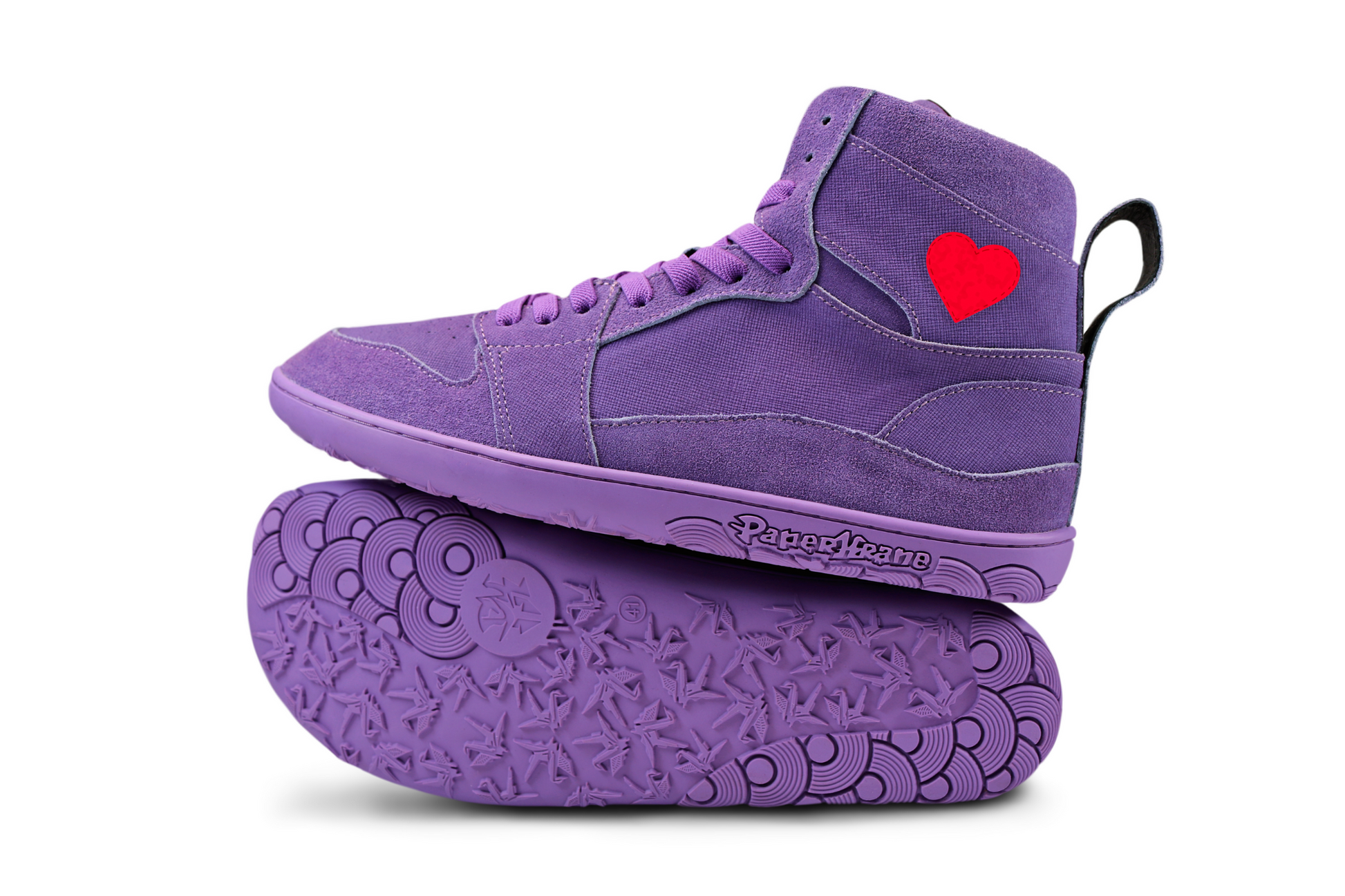 Purple high-top sneakers with a red heart on a white background