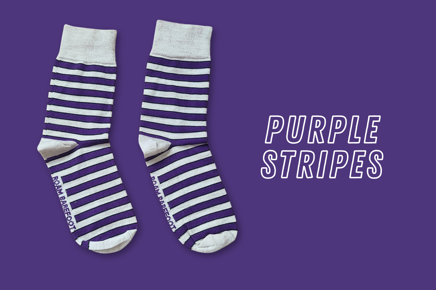 Pair of Roam Barefoot New Zealand made merino socks with purple and beige/grey stripes on a purple background