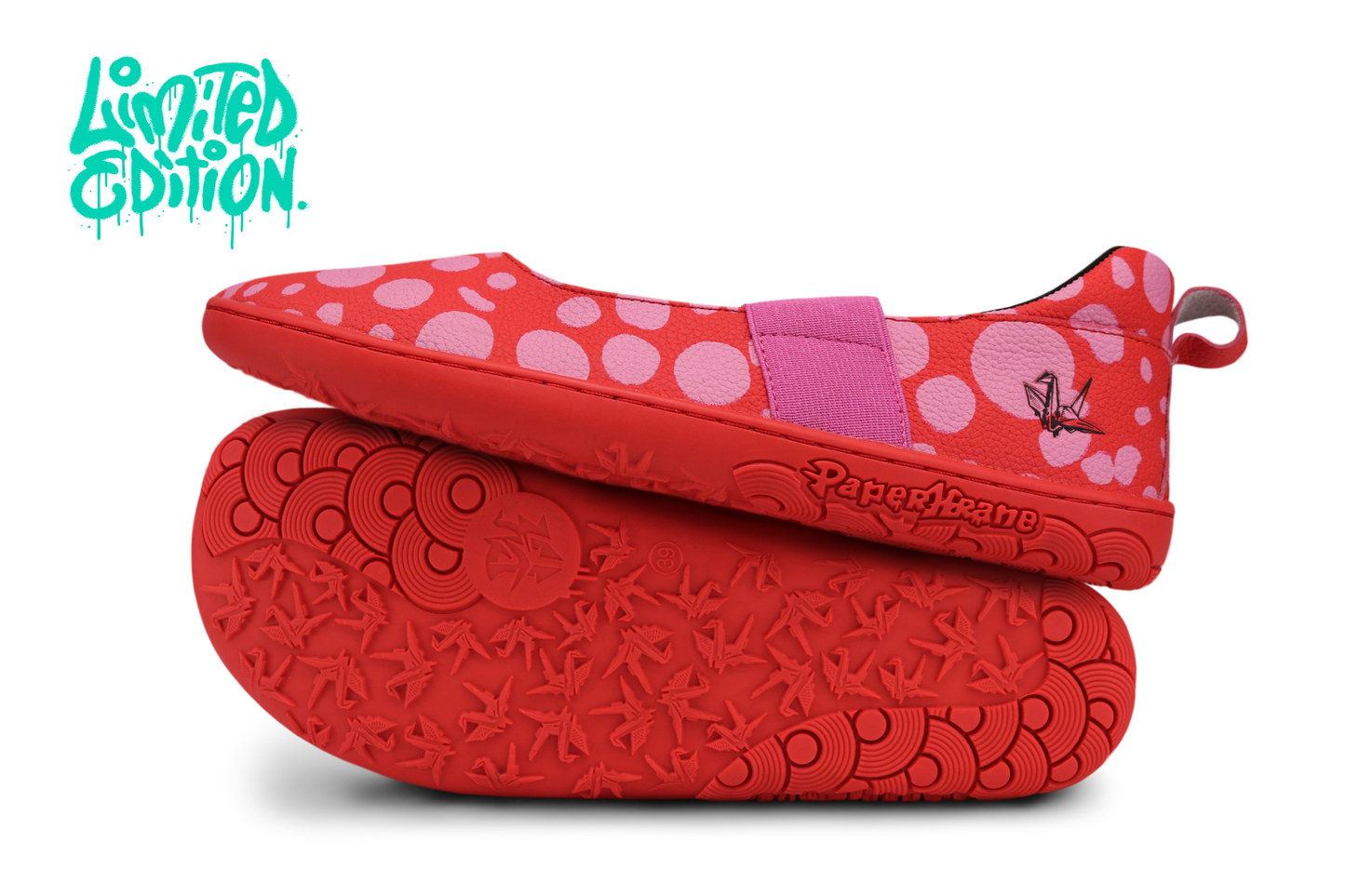 Red leather PaperKrane barefoot mary jane style shoe with bubblegum pink painted spots and pink elastic band, and red rubber soles. They're on a white background with "limited edition" witten in the top left corner.