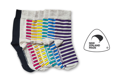 Set of colourful striped socks from Roam Barefoot with 'New Zealand Made' label on a white background