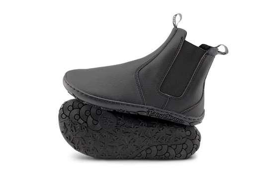 SIDE AND SOLE VIEW OF SLICK BOOT, BLACK VEGAN BAREFOOT CHELSEA BOOT