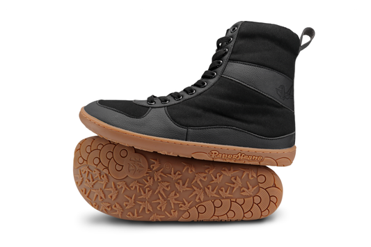 PAPERKRANE VEGAN FRIENDLY BAREFOOT "SNUGG" BOOTS, THEY'RE BLACK ON A GUM SOLE WITH ELASTIC LACES ON A WHITE BACKGROUND 