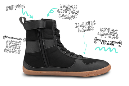 Inside view of black vegan SNUGG boot from PaperKrane. The barefoot boot is tall with elastic laces, in black vegan materials on a gum sole. The background is white and there are product details around the shoe. 
