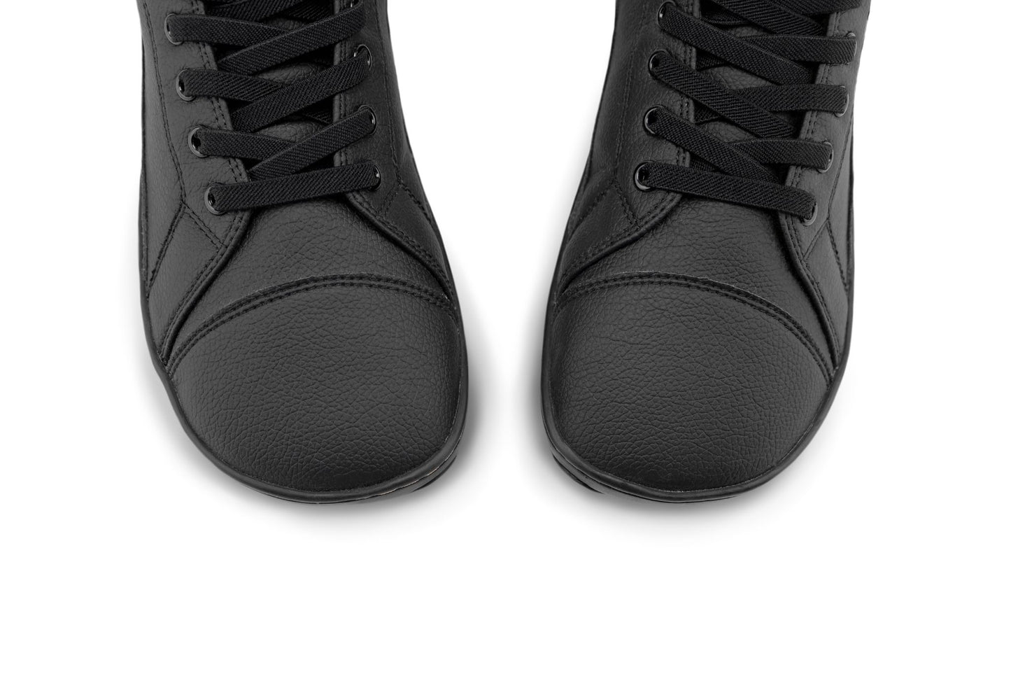 A pair of black vegan leather high-top lace-up shoes shown from a top-down angle on a plain white background.