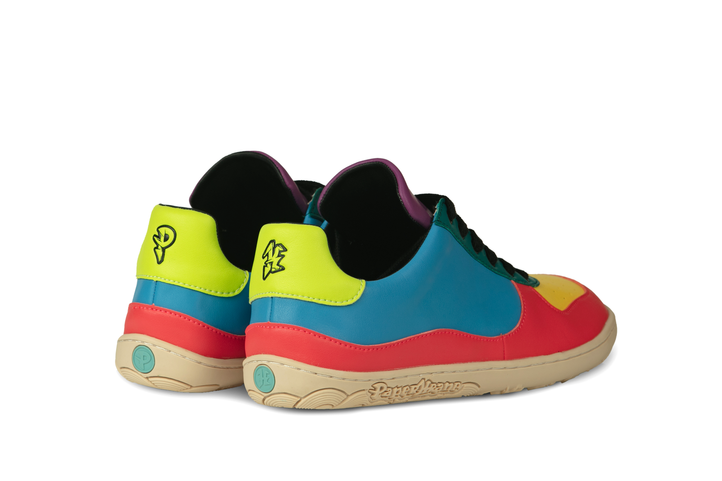 BACK VIEW OF A PAIR OF VEGGIE LOWS. LIME GREEN, BLUE AND RED ON A BEIGE SOLE, CAN SEE A LITTLE YELLOW AND TEAL DETAILS TOO