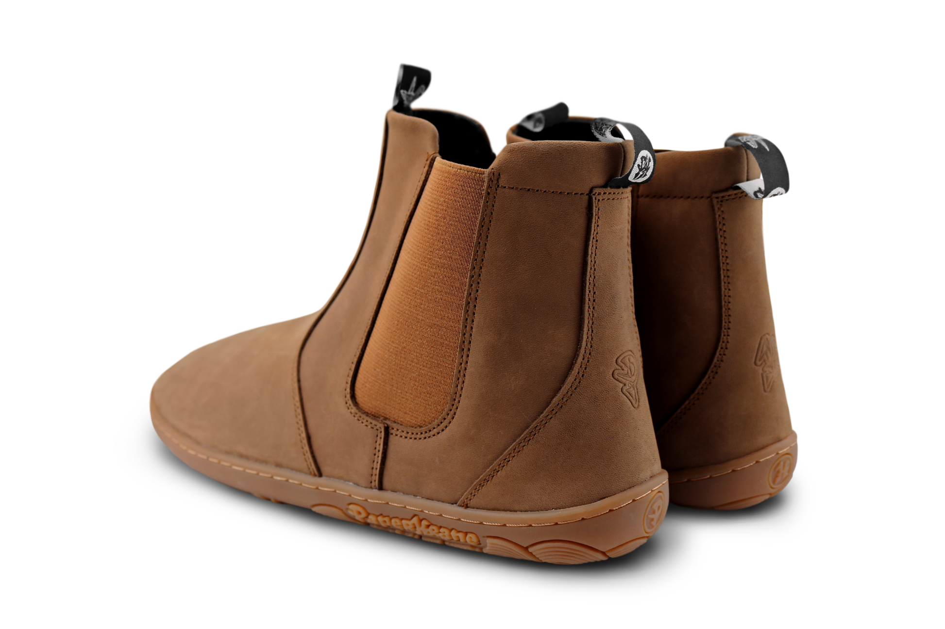 Pair of brown leather boots on a white background view from back