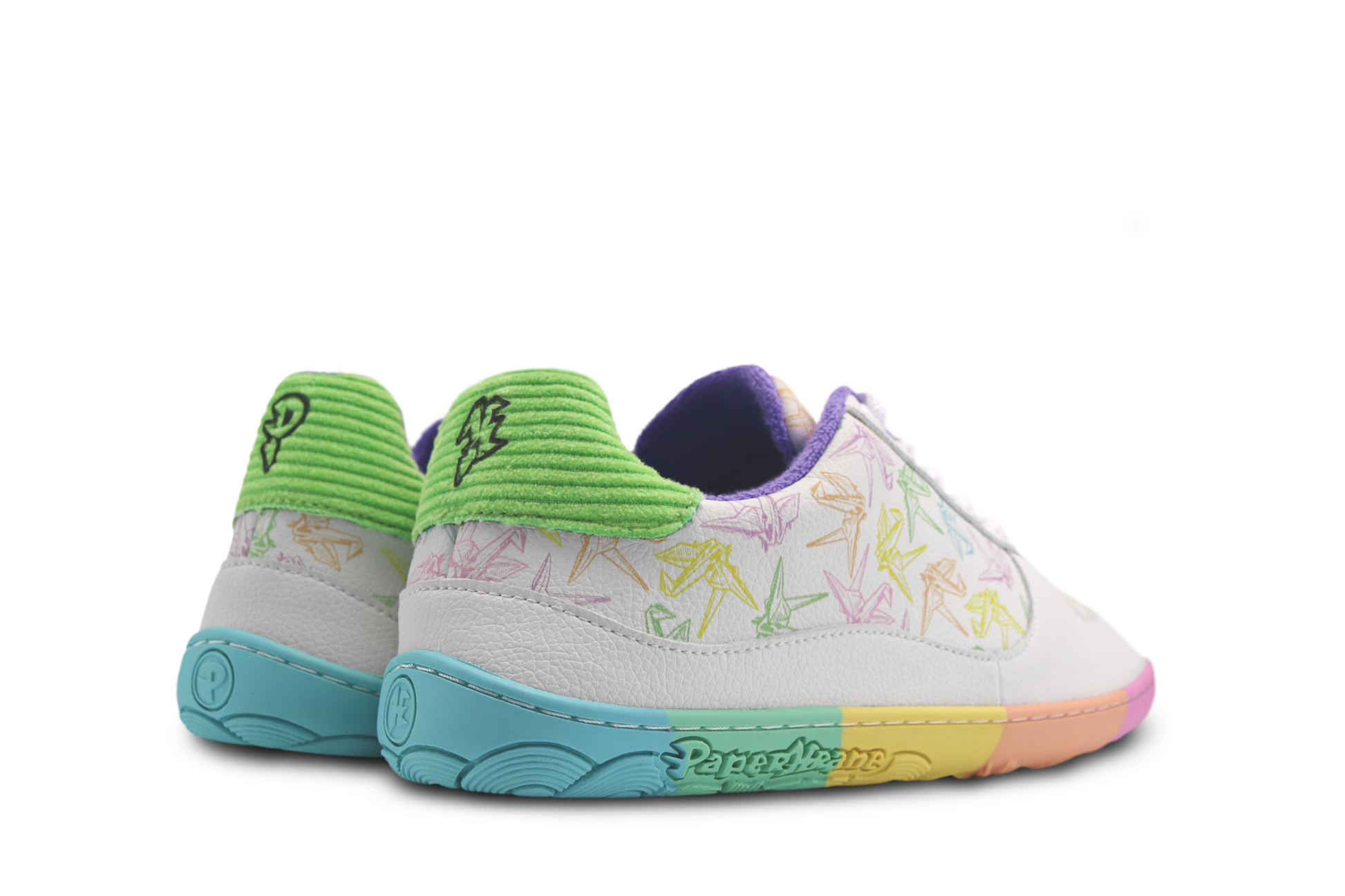 White barefoot sneakers from PaperKrane with a zero drop rainbow sole, and rainbow origami cranes printed on them. Seen from the back with green cord heel detail, on a white background.