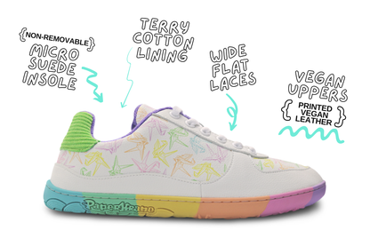 White barefoot sneakers from PaperKrane with a zero drop rainbow sole, and rainbow origami cranes printed on them. 
Seen from the side with shoe details on white background. 