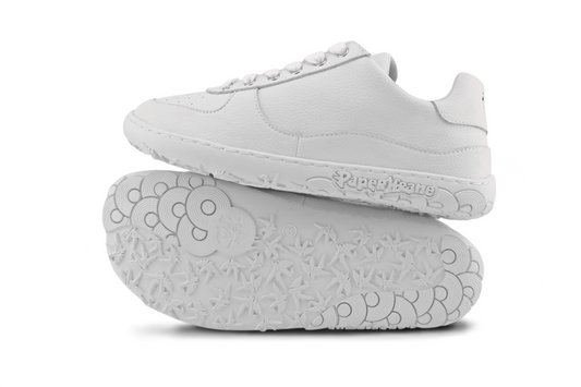 Side and sole view of kids white low barefoot sneakers