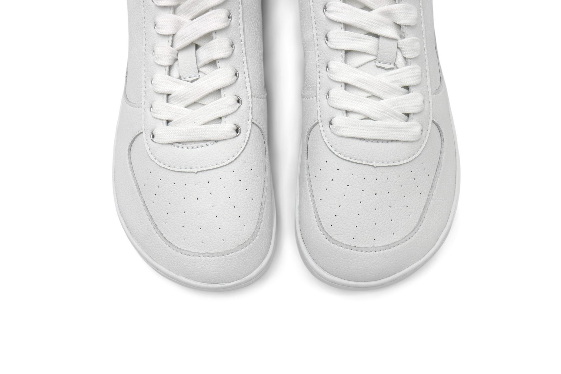 Above white low toes, showing wide toe box on barefoot sneaker.