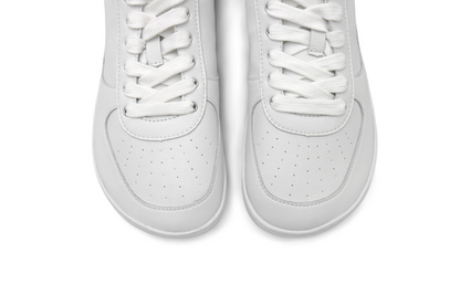Above white low toes, showing wide toe box on barefoot sneaker.