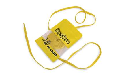Yellow elastic laces with a small pouch featuring PaperKrane branding on a white background